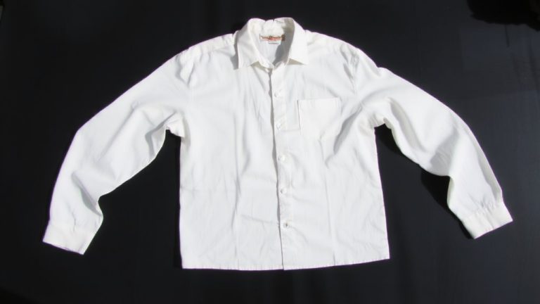 unbutton before folding